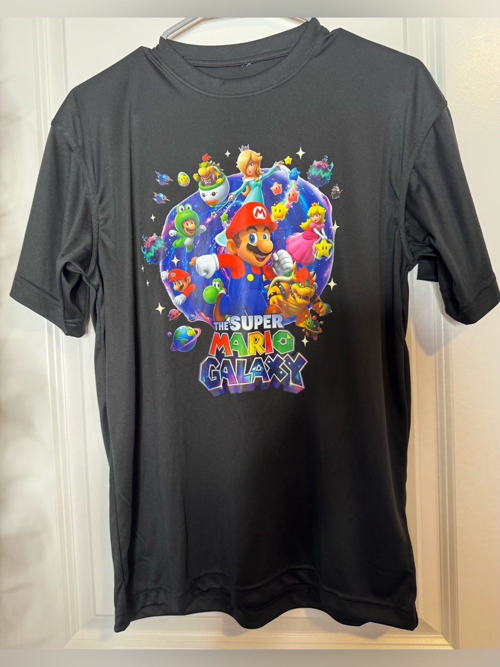 The Super Mario Galaxy Black Graphic Tee movie size Md stretch short sleeve